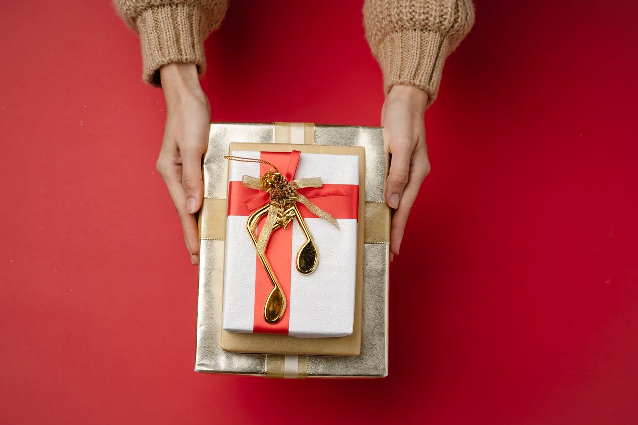 A festive gift box tied with a golden ribbon